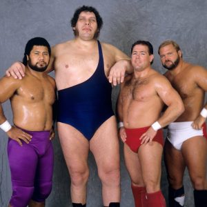 Tully Blanchard Autographed 8x10 Photo featuring Haku, Andre the Giant & Arn Anderson