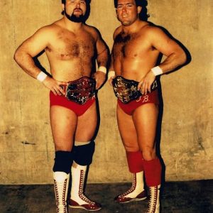 Tully Blanchard Autographed 8x10 Photo as NWA World Tag Team Champion with Arn Anderson